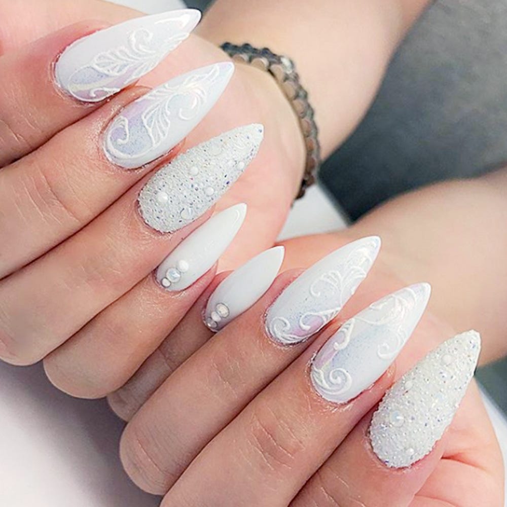 9 Cute Snowflake Nail Designs –Snowflake Nail Art Ideas for a Winter Manicure