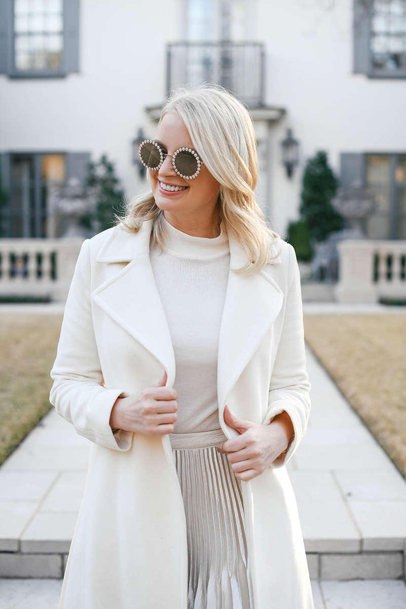 Cream Wool Coat Over Turtleneck and Pleated Skirt — Winter White Outfits
