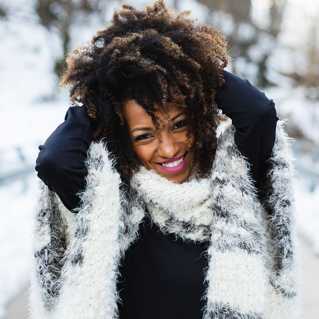 Voluminous Curls With Caramel Highlights Voluminous Curls With Caramel Highlights — Winter Haircuts for Black Women