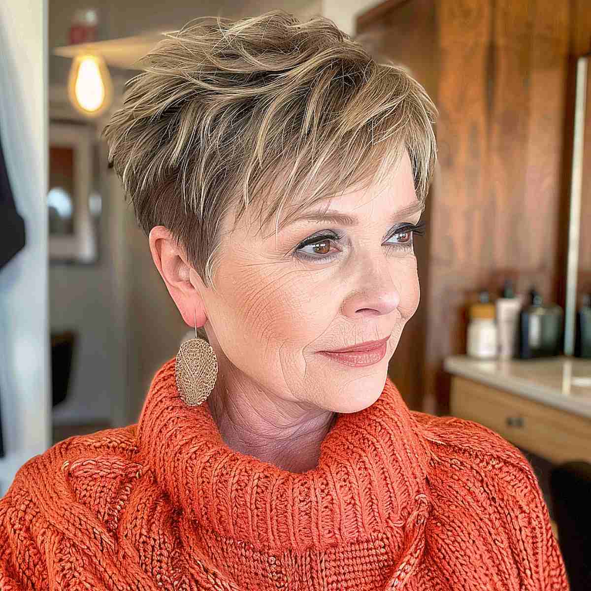 Textured Ash Blonde Pixie With Dark Roots — Winter Hair Colors for Women Over 60