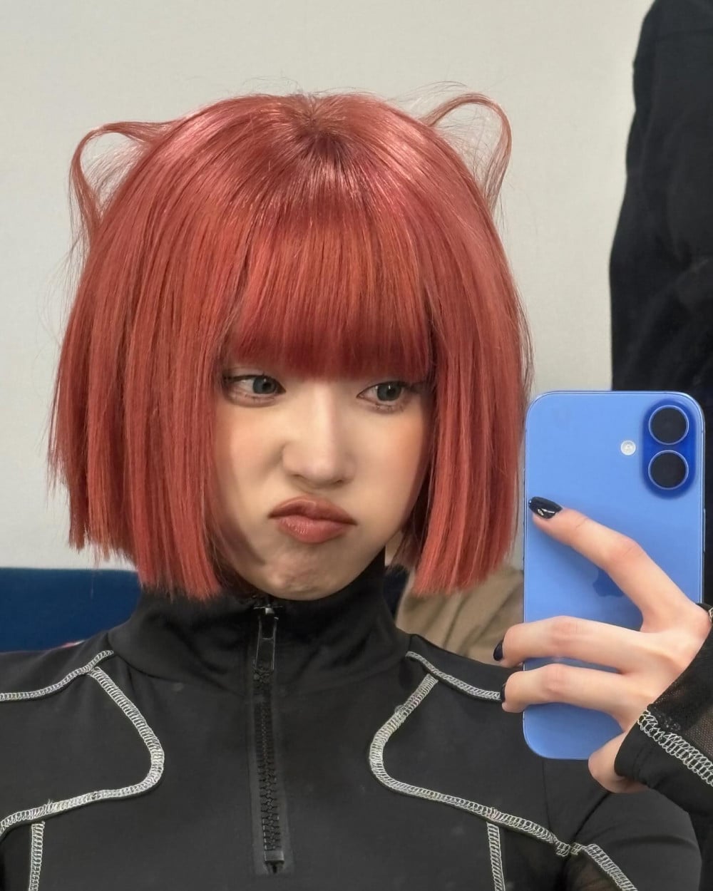 Reddish-Orange Bob With Blunt Bangs — Winter Hair Colors for Short Hair