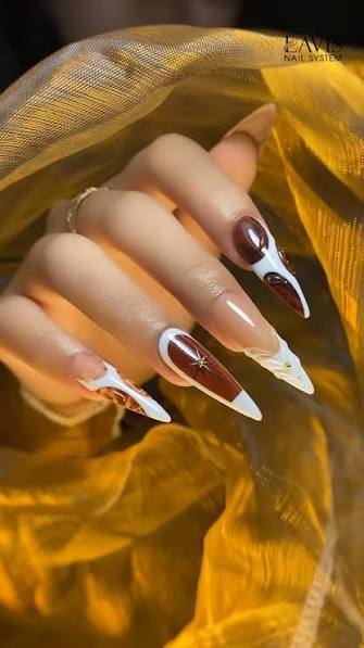 Abstract Swirls and Star Long Stilettos Abstract Swirls and Star Long Stilettos — brown nail designs
