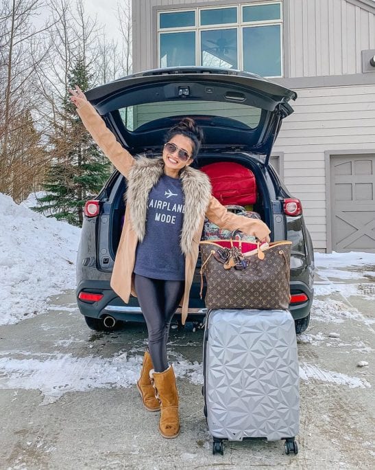 Tan Ugg-Style Boots with a Fur-Trimmed Coat for Travel Tan Ugg-Style Boots with a Fur-Trimmed Coat for Travel — Snow Boots Outfits