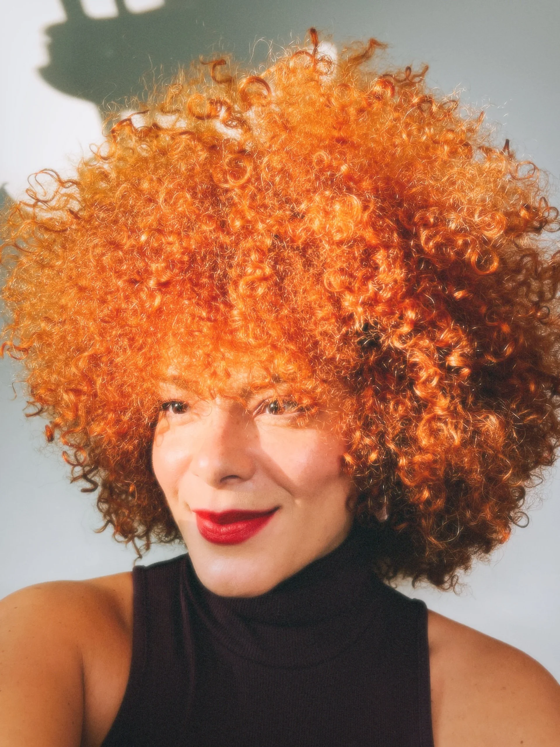 Vibrant Copper With Side Bangs — Winter Hair Colors for Curly Hair