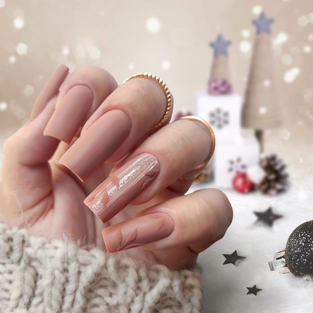 Nude Matte With Embossed Leaf Motif Nude Matte With Embossed Leaf Motif — Winter Matte Nails