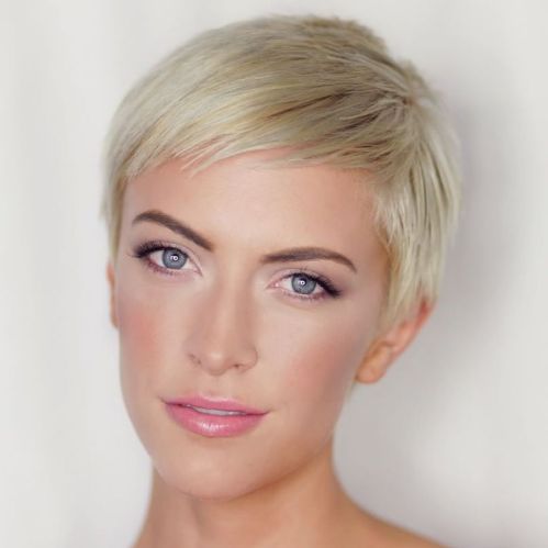 Sleek Platinum Blonde Pixie With Side Bangs Sleek Platinum Blonde Pixie With Side Bangs — Winter Pixie Haircuts