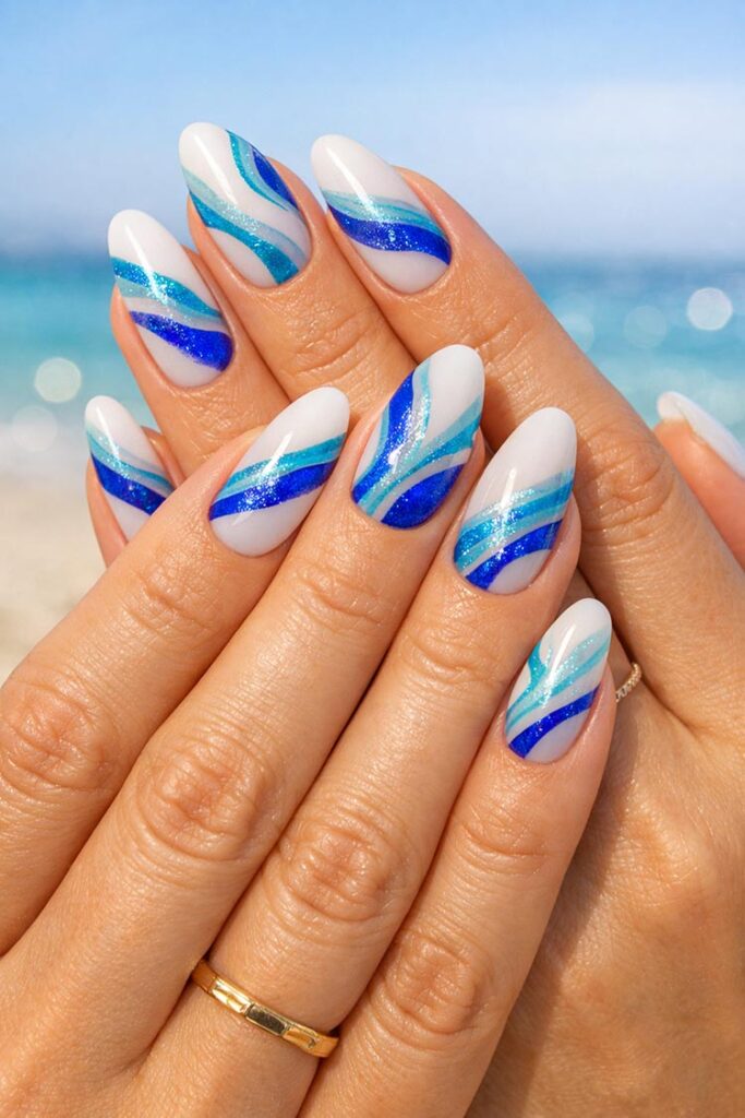 Blue Wavy Stripe Almond Nails Blue Wavy Stripe Almond Nails — almond nail designs
