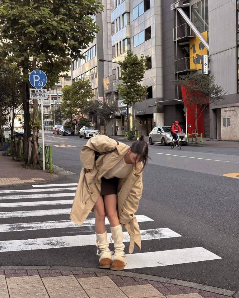 Beige Trench Coat with Brown Shorts and Knit Leg Warmers — Japan Winter Outfits