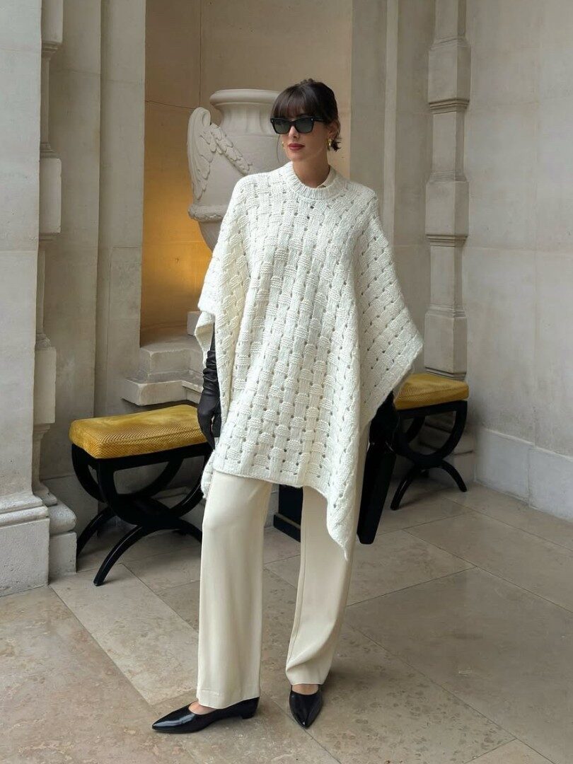 White Knit Poncho Over Wide-Leg Pants with Pointed Flats — Paris Winter Outfits