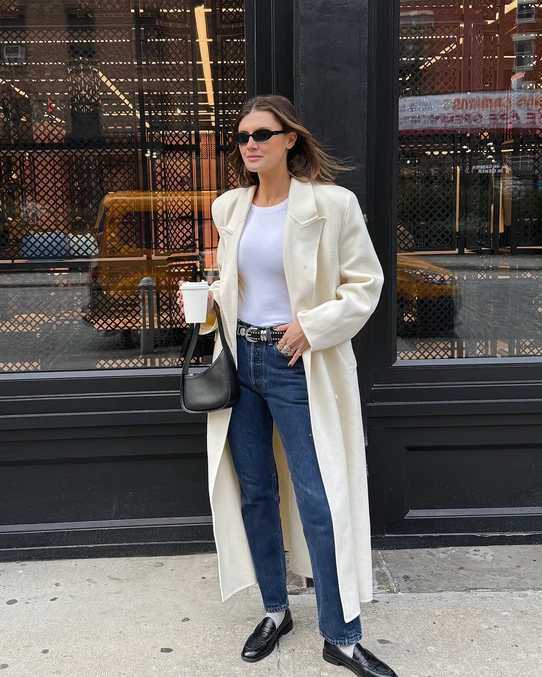 Long Cream Coat Over T-Shirt and Straight-Leg Jeans — Winter to Spring Transition Outfits