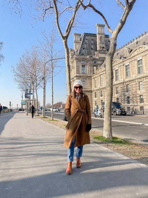 Tan Wrap Coat with Orange Ankle Boots for a Pop of Color — Europe Winter Outfits