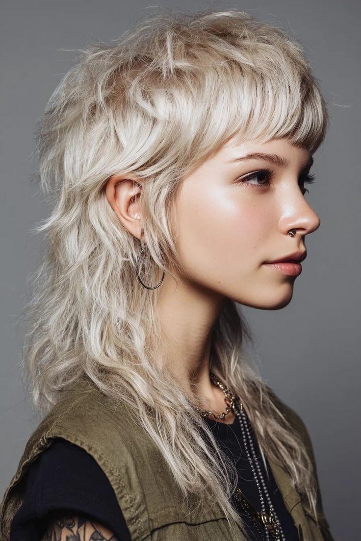 Chin Shag Platinum Blonde With Tousled Finish Chin Shag Platinum Blonde With Tousled Finish — Winter Shag Haircuts
