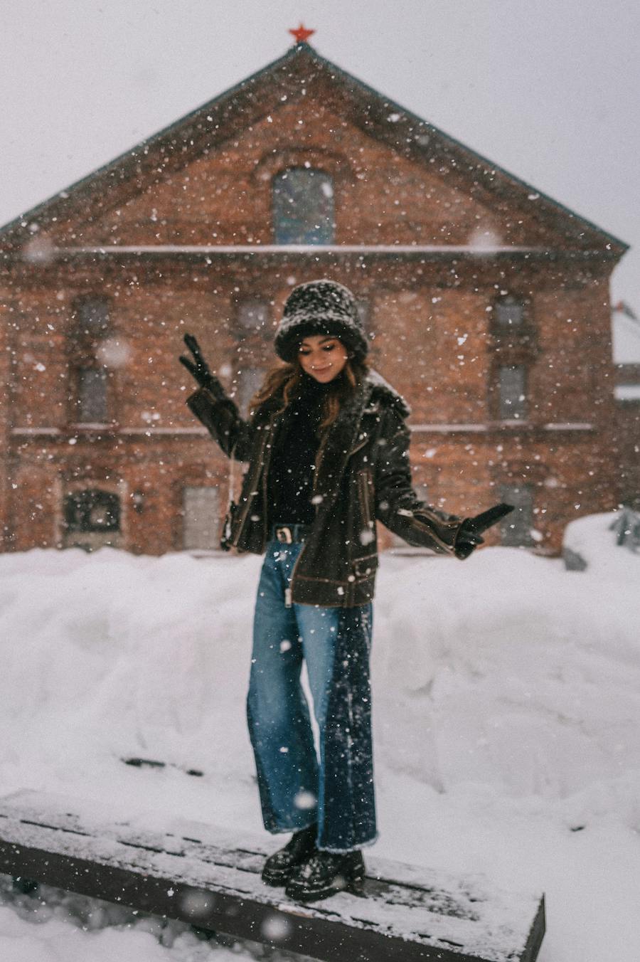Faux Fur Lined Jacket with Wide-Leg Jeans and Bucket Hat — Japan Winter Outfits