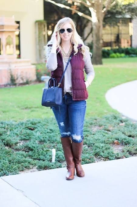 Burgundy Puffer Vest with Distressed Denim and Knee-High Boots — Puffer Vest Outfits