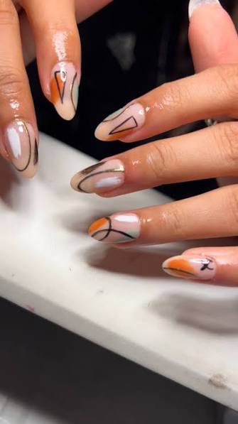 Nude Almond with Black Geometric Abstract — trendy almond nail designs