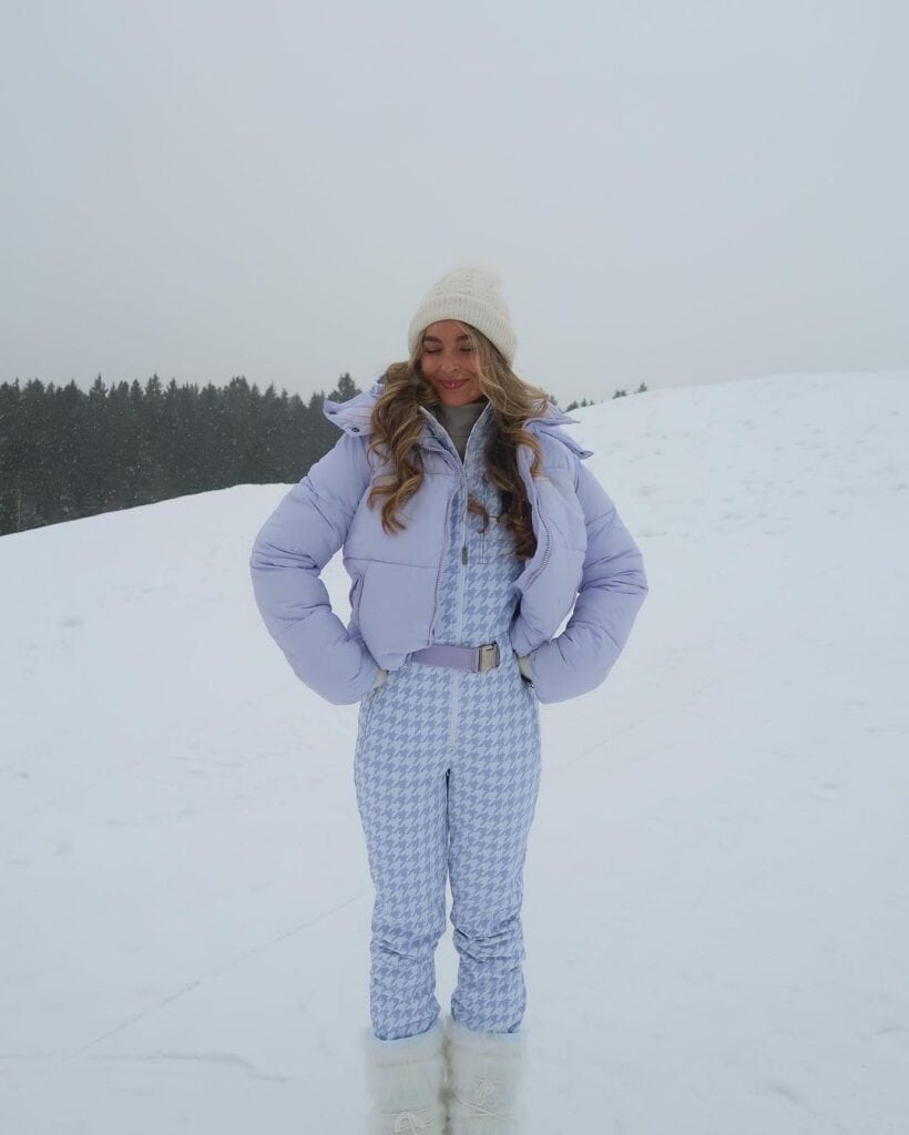 Lilac Puffer Jacket Over Ski Suit for a Playful Winter Look — Europe Winter Outfits