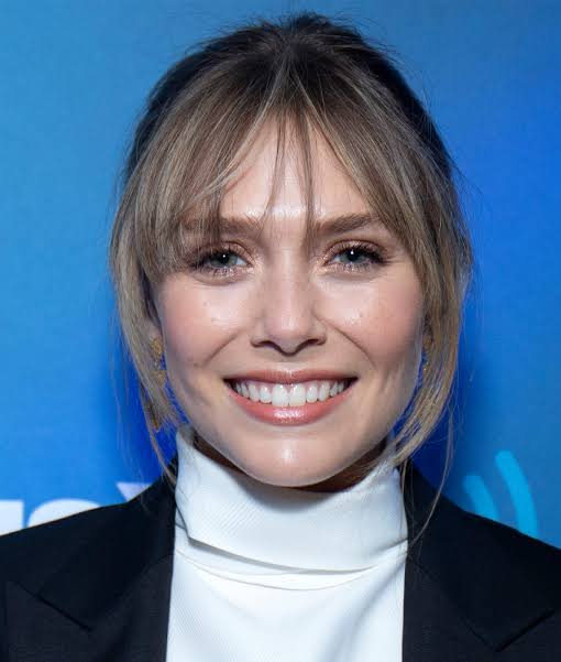 Light Brown Bob with Wispy Bangs Light Brown Bob with Wispy Bangs — Winter Haircuts for Oval Faces