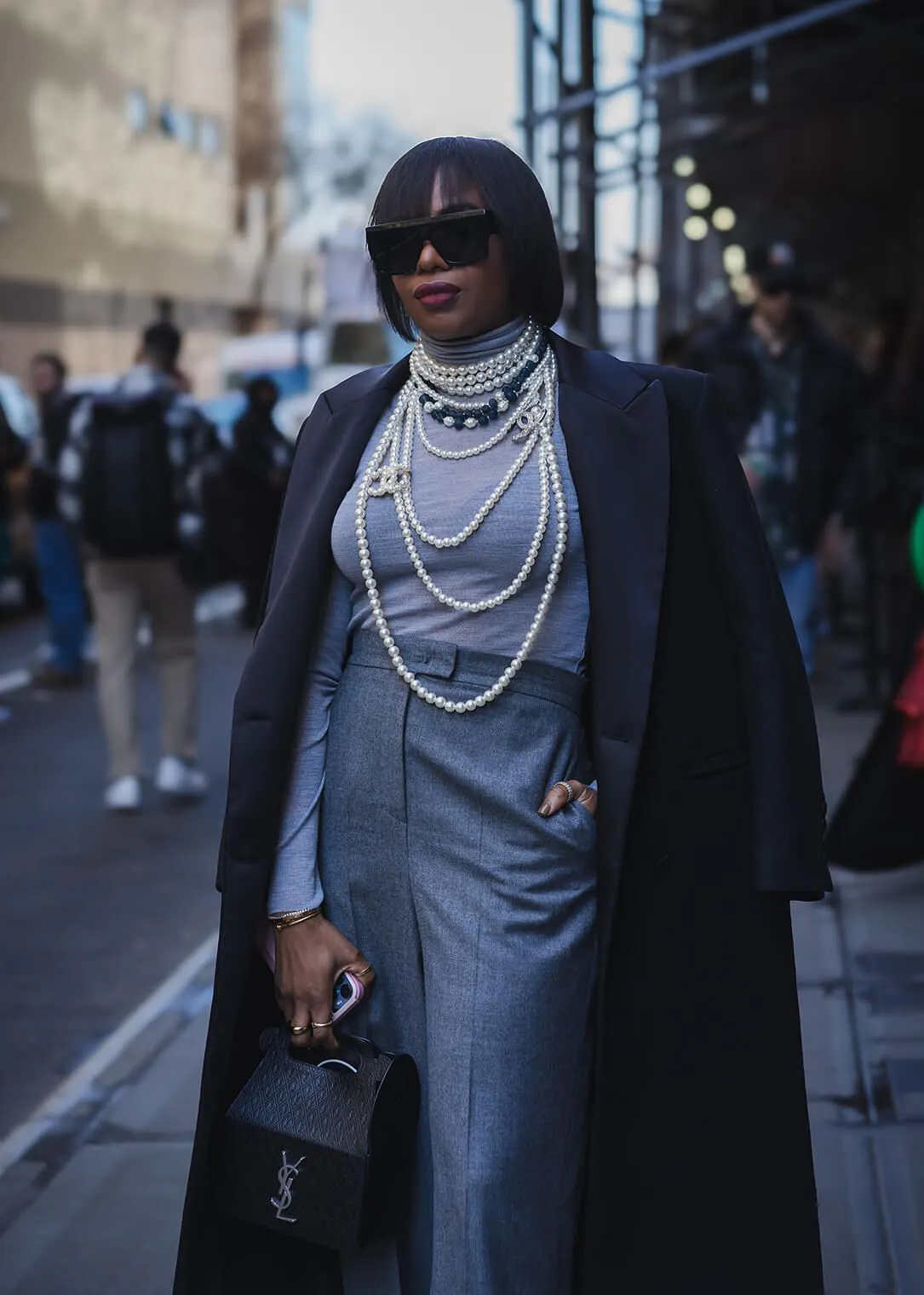 Long Black Coat Over Grey Separates with Layered Pearls — NYC Winter Outfits
