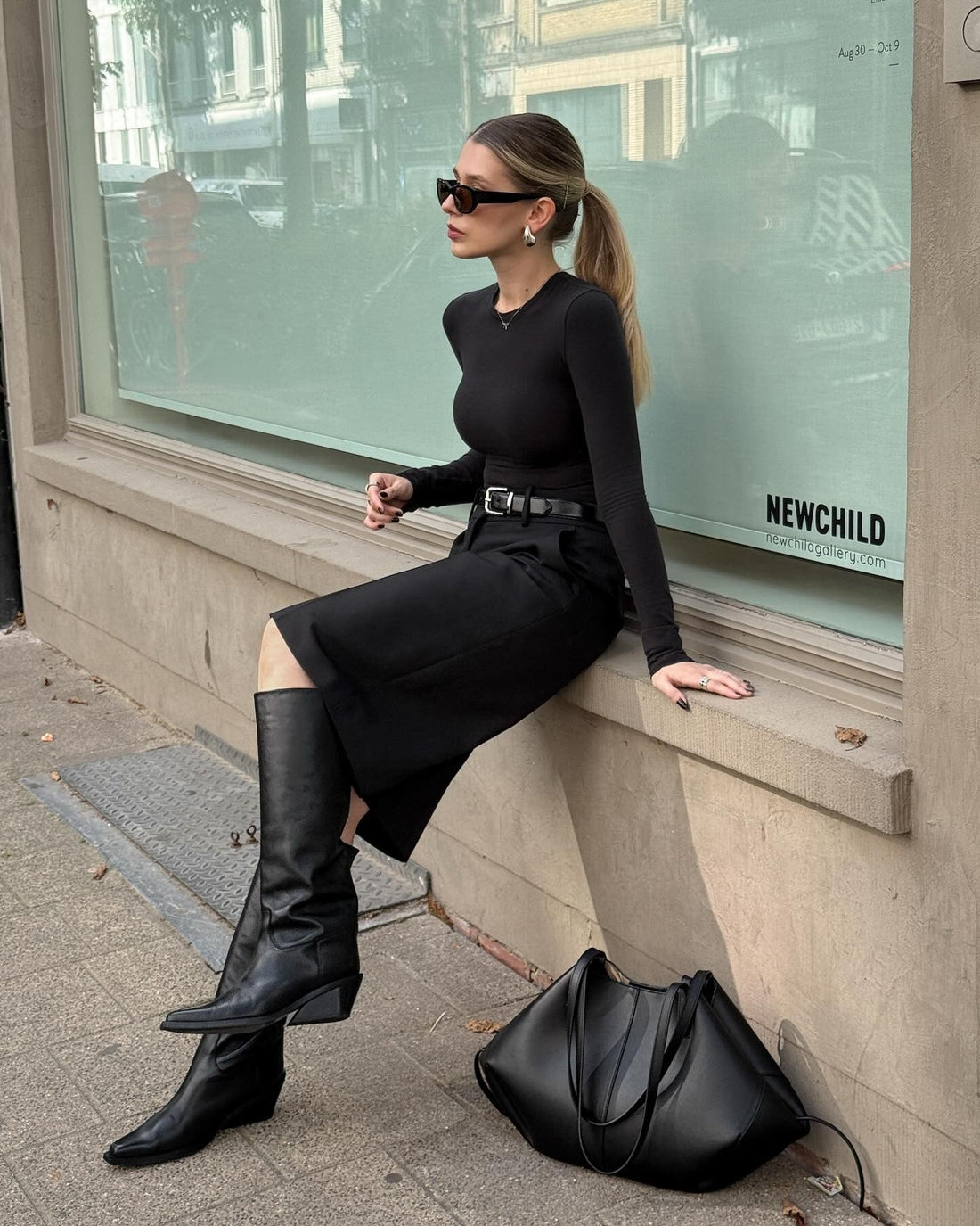 Monochromatic Sophistication: Black Midi Skirt and Knee-High Pointed Boots — Black Boots Outfits