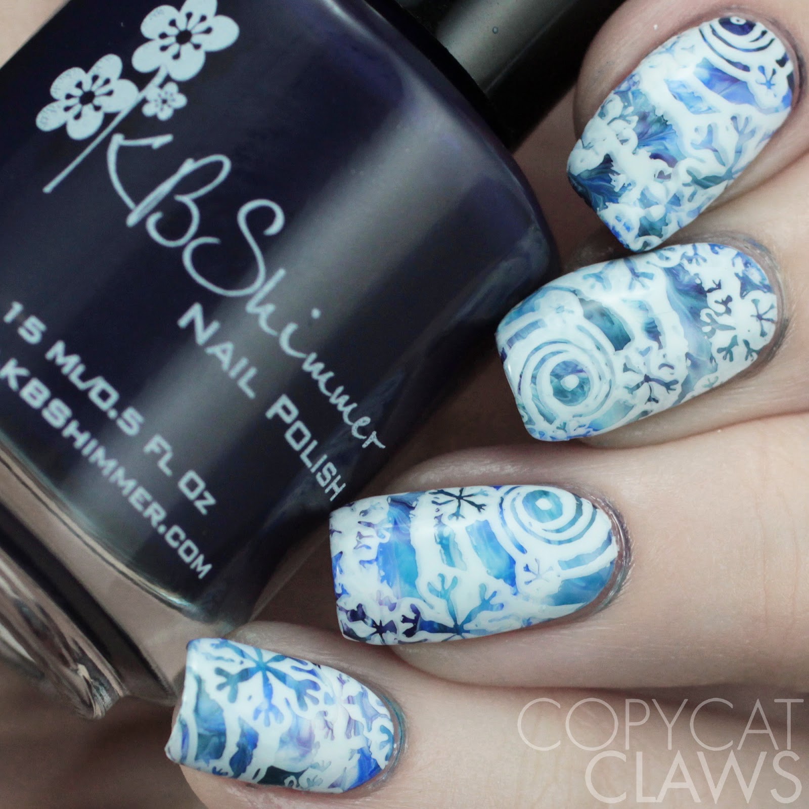 White Blue Snowflakes Stamped Oval Nails — Winter Marble Nails