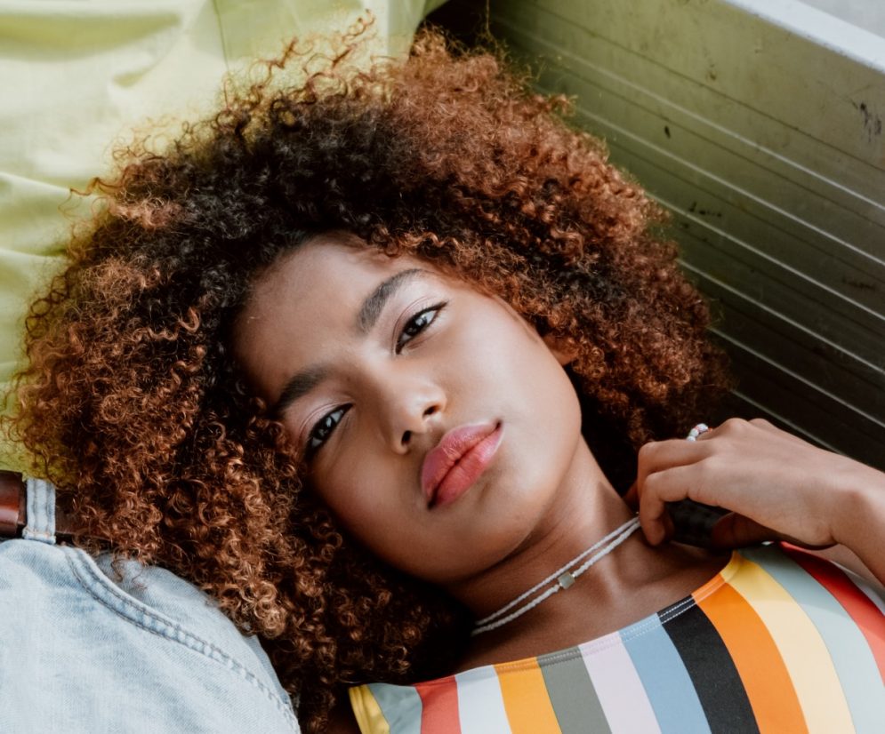 Warm Honey Blonde With Darker Roots — Winter Hair Colors for Curly Hair