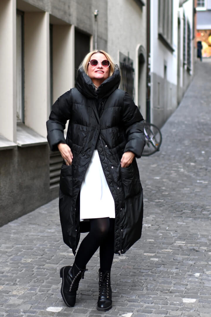 Dramatic Black Puffer with High Collar and Combat Boots — Long Puffer Coat Outfits