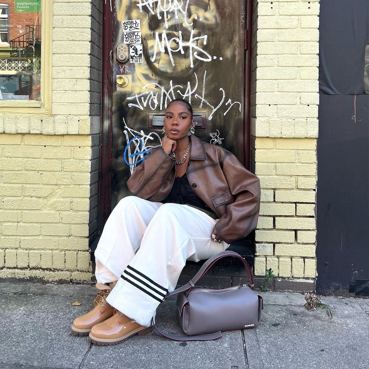 Oversized Layers: Leather Jacket with Striped Pants — Timberland Boots Outfits