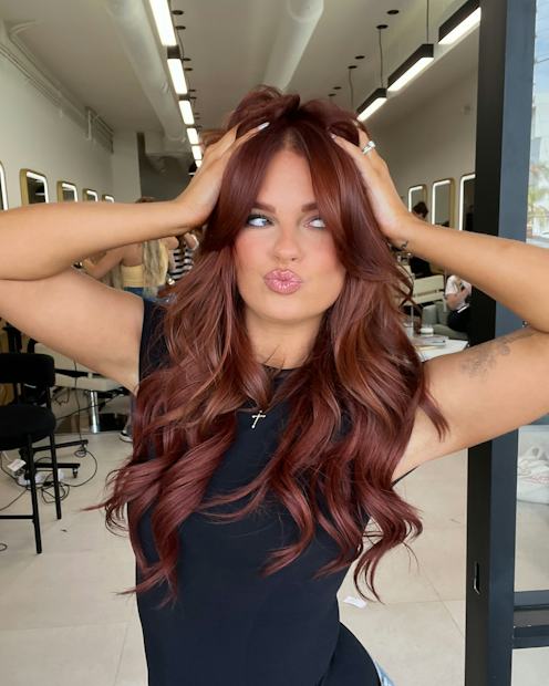 Mid-Back Auburn Waves With Curtain Bangs Mid-Back Auburn Waves With Curtain Bangs — Winter Haircuts for Women