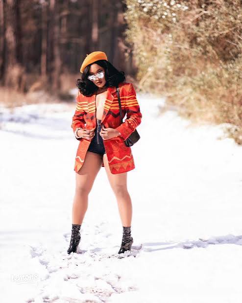 Vibrant Patterned Blazer with Black Shorts and Orange Beret Vibrant Patterned Blazer with Black Shorts and Orange Beret — Winter Outfits for Black Girls