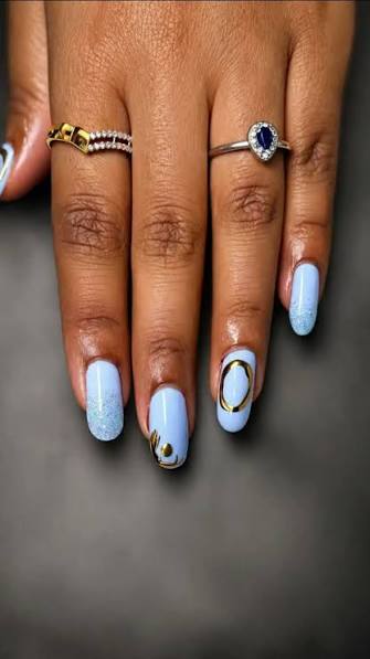 Baby Blue Gold Swirl Oval Nails Baby Blue Gold Swirl Oval Nails — classy simple nail designs