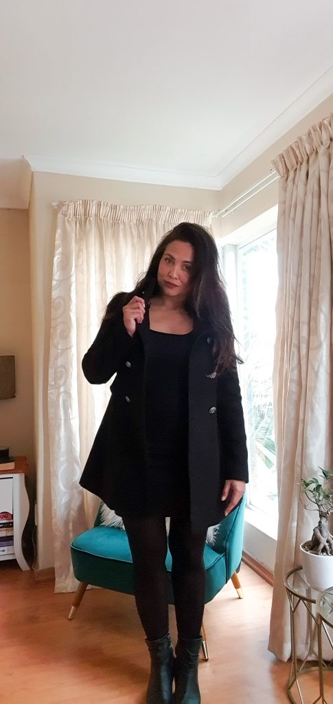 Black Fit-and-Flare Coat Over Fitted Dress Black Fit-and-Flare Coat Over Fitted Dress — Winter Date Night Outfits