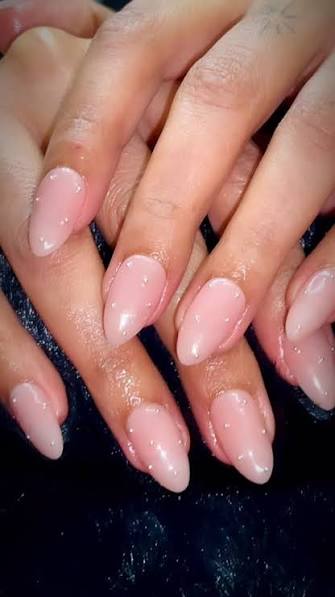 Light Pink Almond with Small White Dots — trendy almond nail designs