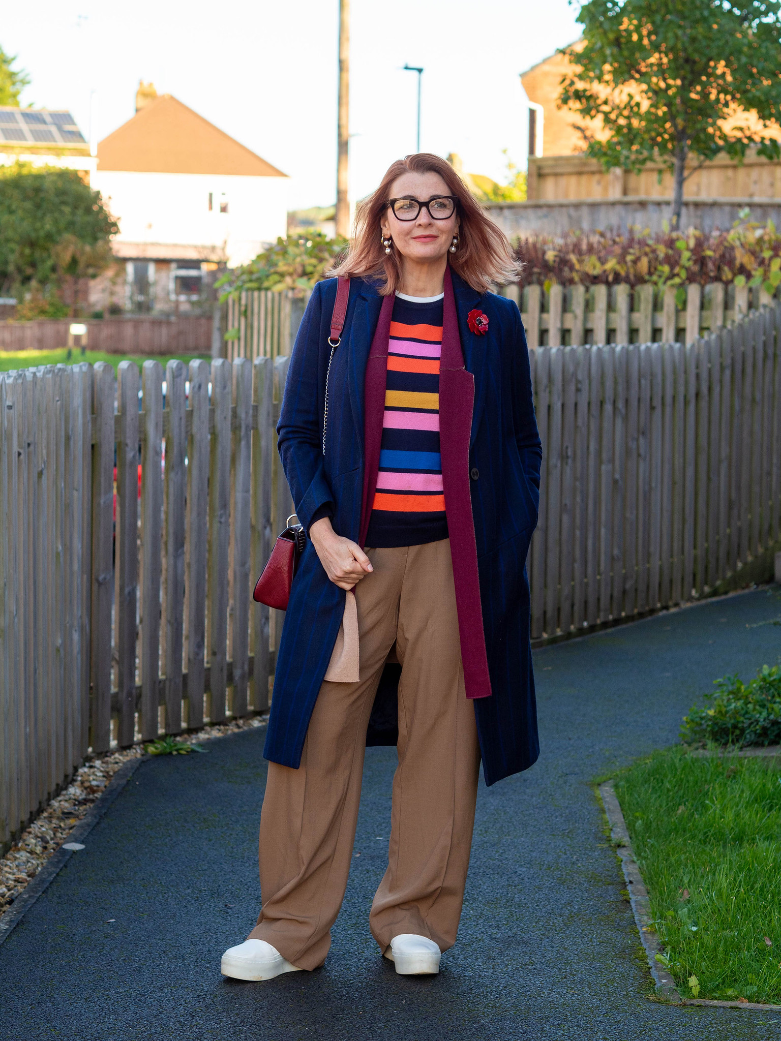 Navy Coat Over Stripes and Wide-Leg Trousers Navy Coat Over Stripes and Wide-Leg Trousers — Winter Outfits for Women Over 50