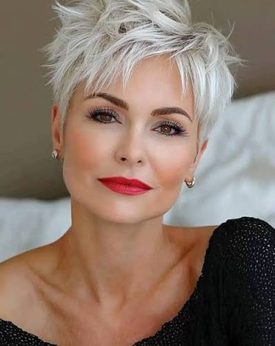 Spiky Platinum Pixie with Swept Bangs Spiky Platinum Pixie with Swept Bangs — very short women haircuts
