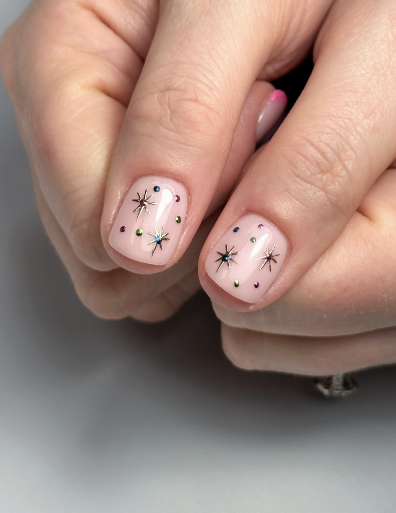 Sheer Pink with Star Studs & Rhinestones Sheer Pink with Star Studs & Rhinestones — Short Winter Acrylic Nails