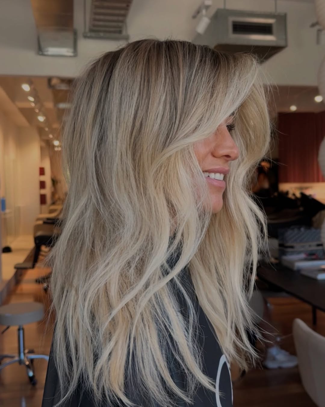 Platinum Blonde With Curtain Bangs Platinum Blonde With Curtain Bangs — Winter Hair Colors for Women Over 40