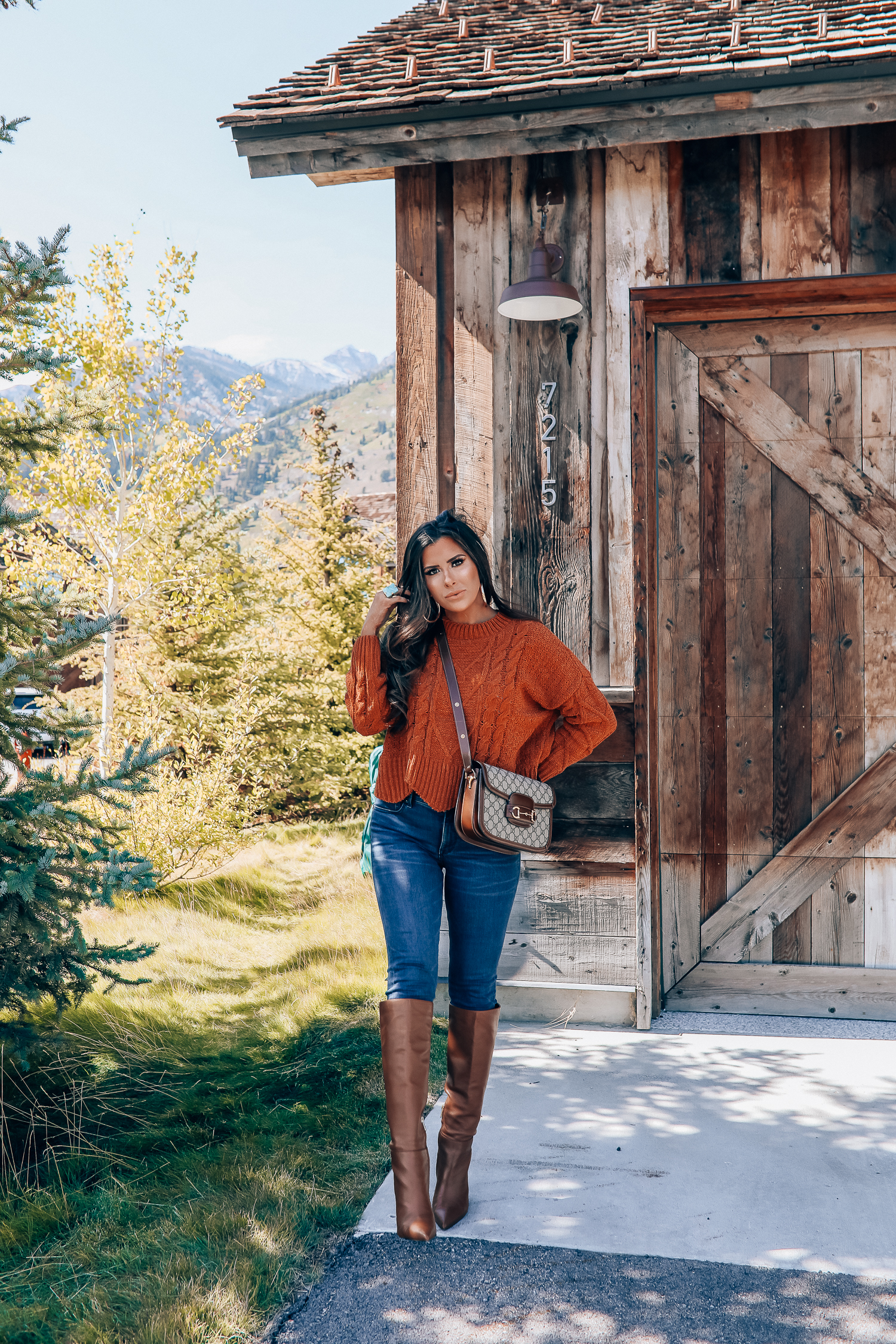 Vibrant Knitwear: Orange Sweater and Denim Vibrant Knitwear: Orange Sweater and Denim — Cabin Trip Outfits
