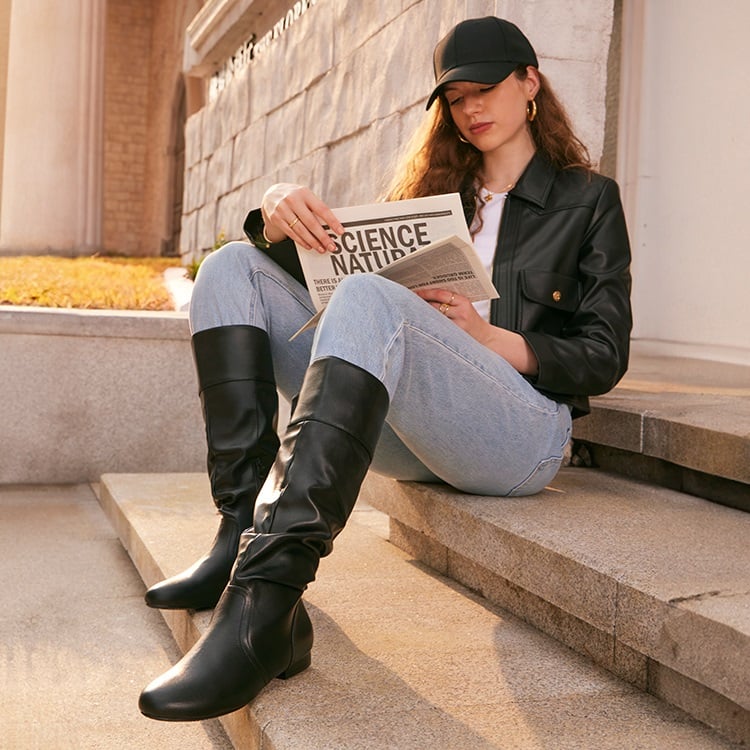 Three-Quarter Body Classic Casual: Black Knee-High Boots with Jeans and Leather Jacket — Black Boots Outfits