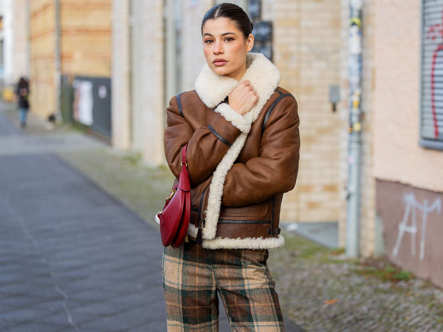 Shearling Jacket Paired with Plaid Trousers for a Chic Casual Look Shearling Jacket Paired with Plaid Trousers for a Chic Casual Look — Colorful Winter Outfits