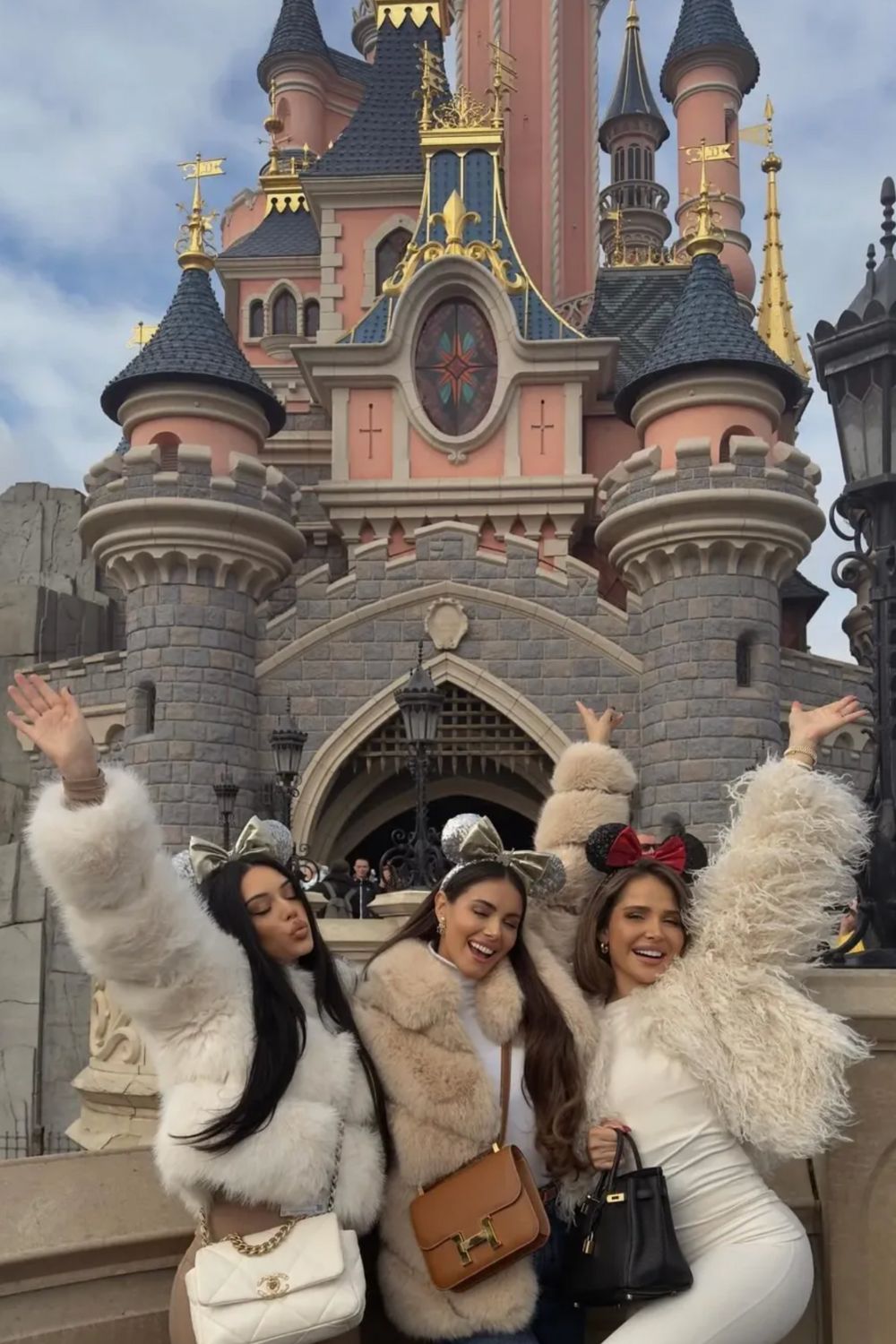 Faux Fur Coats and Minnie Ears for a Chic Park Evening Faux Fur Coats and Minnie Ears for a Chic Park Evening — Disney Winter Outfits