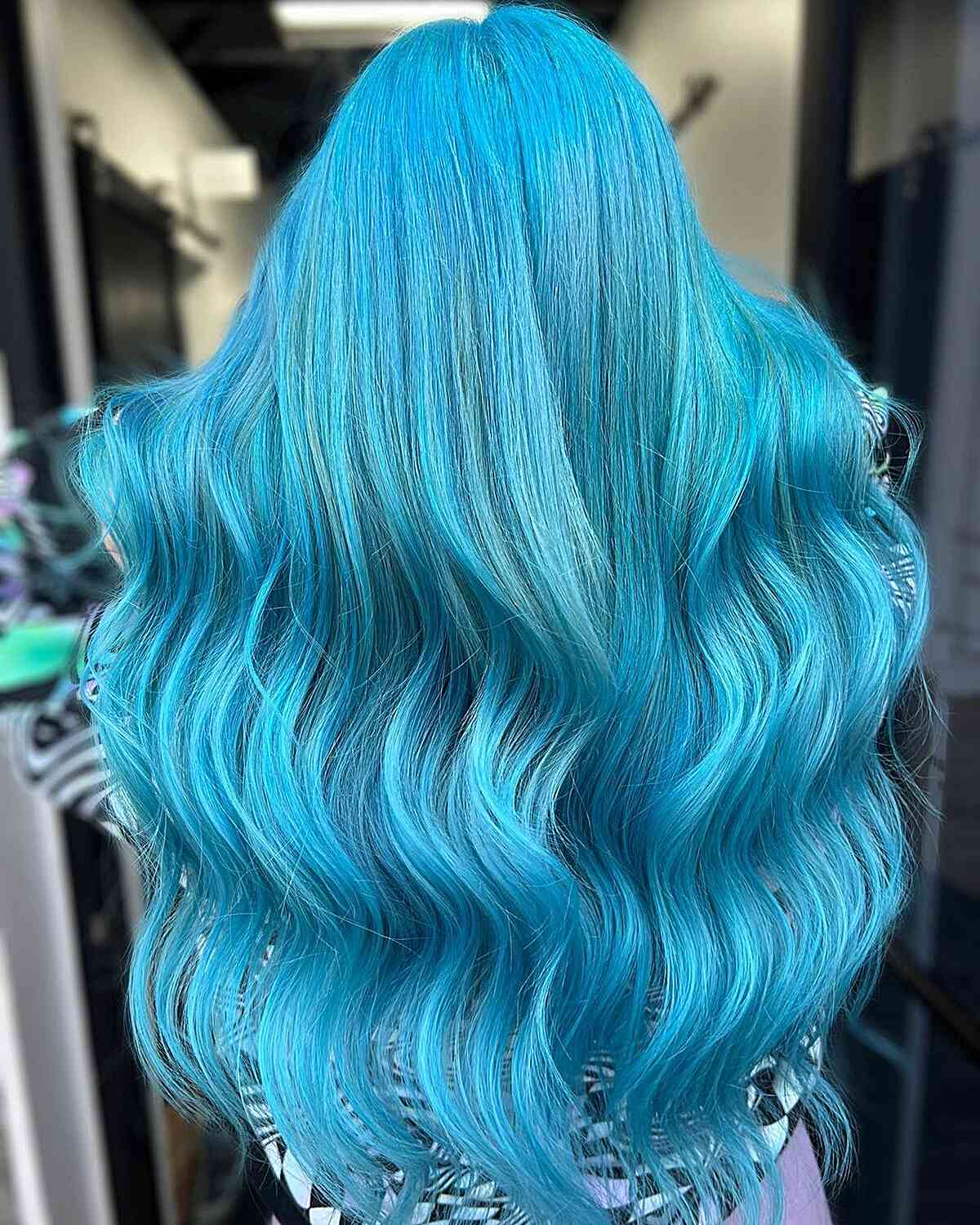 Vivid Blue Mid-Back Waves — Winter Hair Colors for Blue Eyes