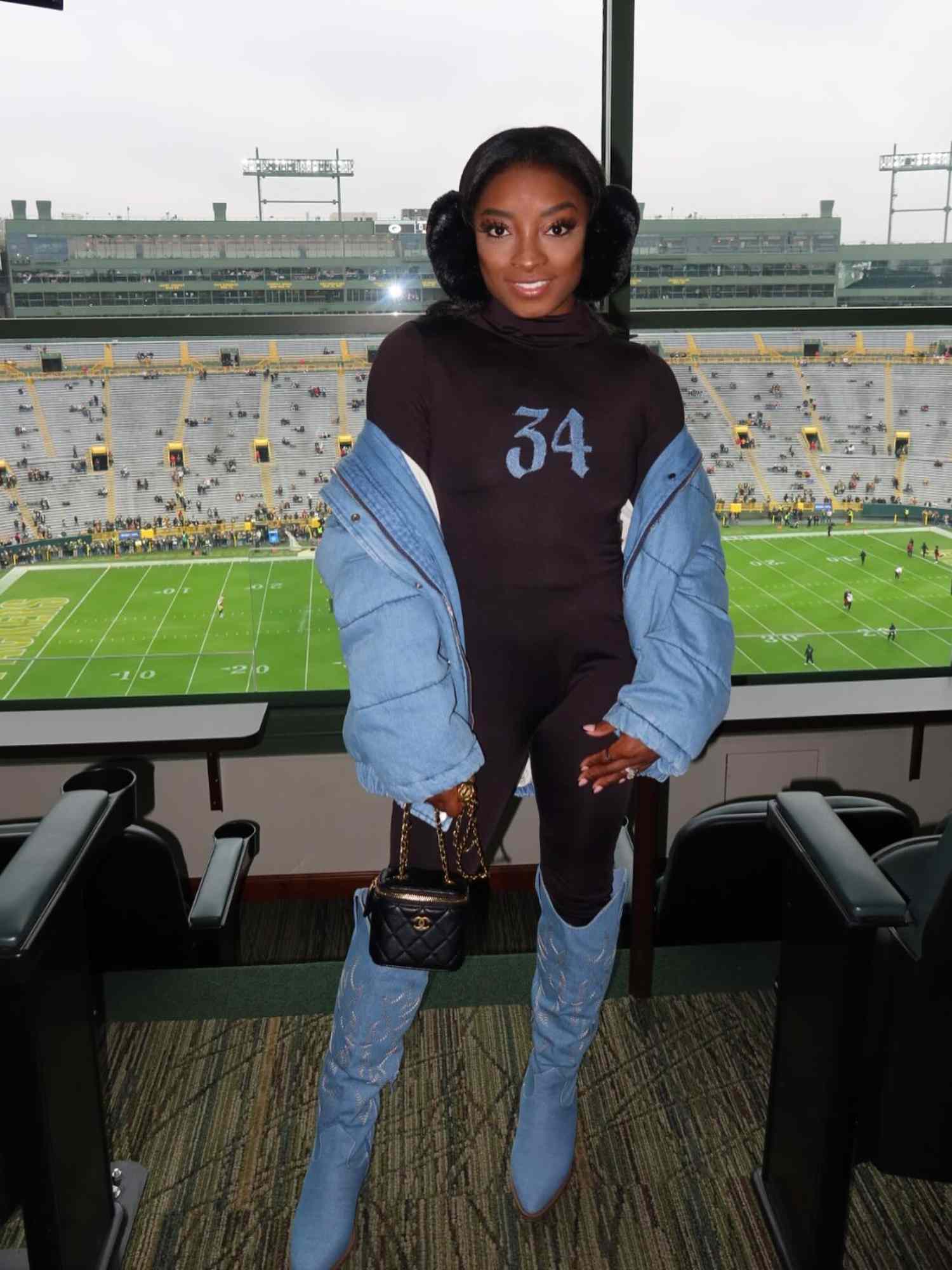 Unexpected Mix: Black Earmuffs with Denim and Cowboy Boots Unexpected Mix: Black Earmuffs with Denim and Cowboy Boots — Earmuffs Outfits
