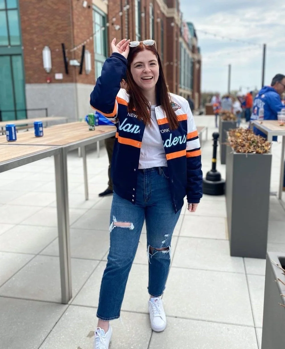 Varsity Jacket and Sneakers for a Classic Sports Fan Look — Hockey Game Outfits
