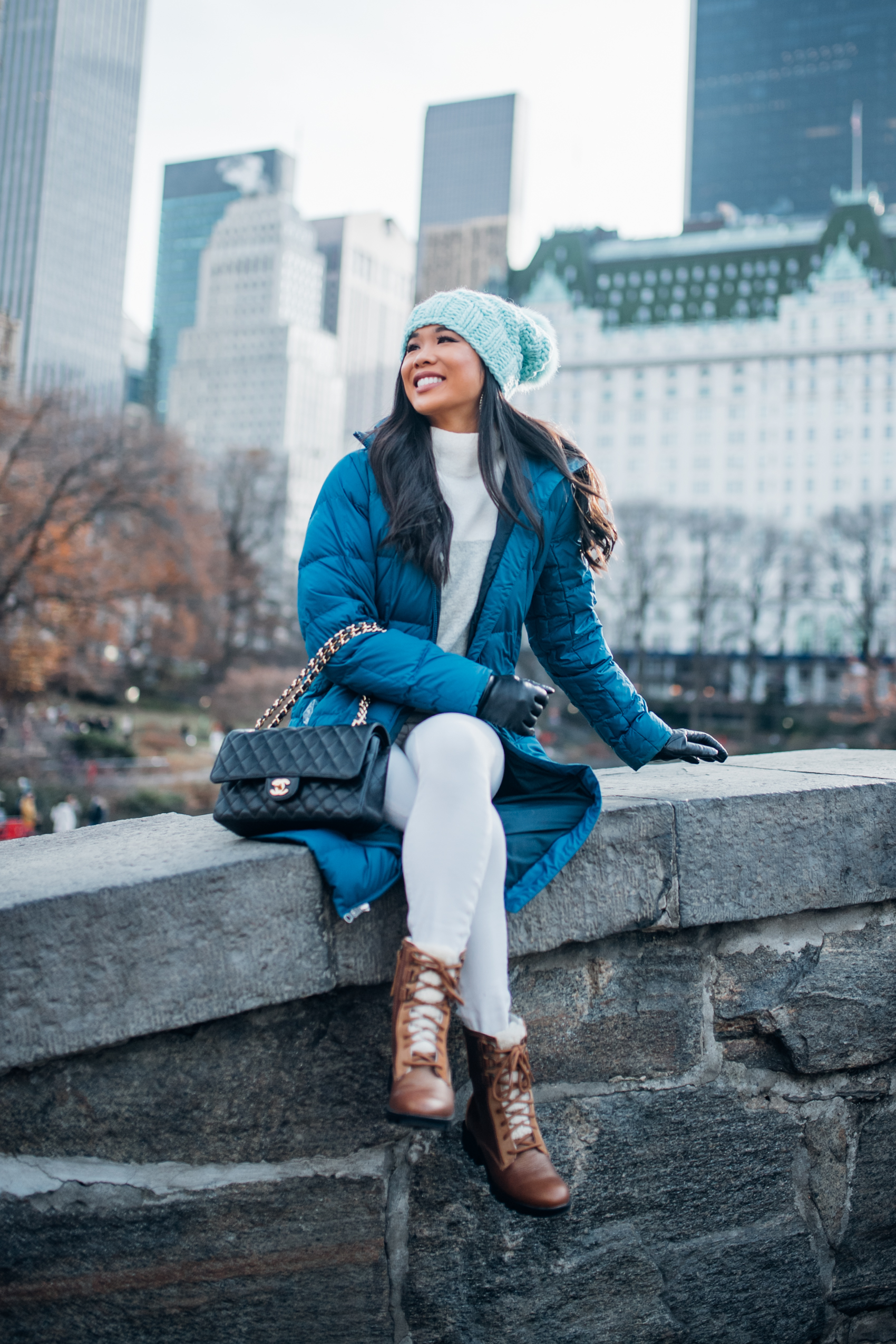 Teal Puffer Coat with White Sweater and Slim Trousers Teal Puffer Coat with White Sweater and Slim Trousers — Winter Outfits for Warm Weather