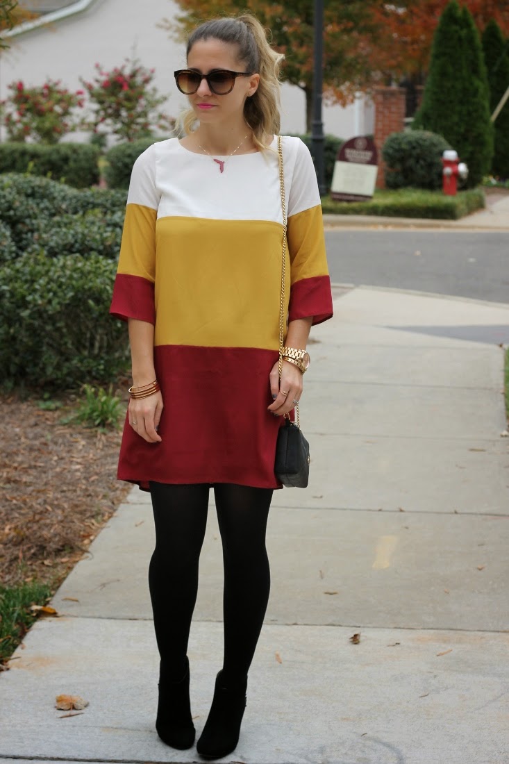 Chic Color-Blocked Dress with Black Tights and Boots Chic Color-Blocked Dress with Black Tights and Boots — Cold Weather Game Day Outfits
