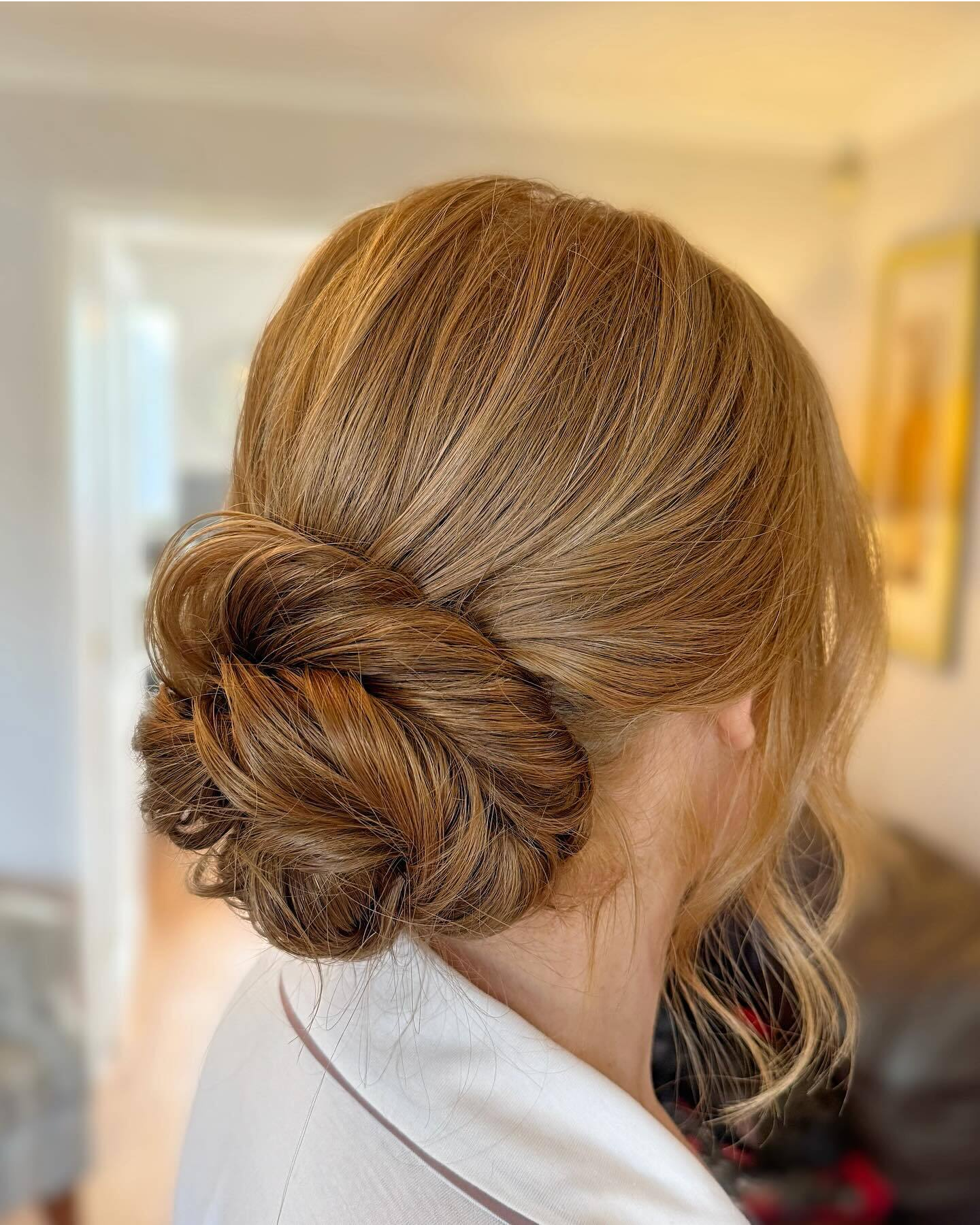 Honey Blonde Low Bun Updo Honey Blonde Low Bun Updo — Winter Haircuts for Thick Hair