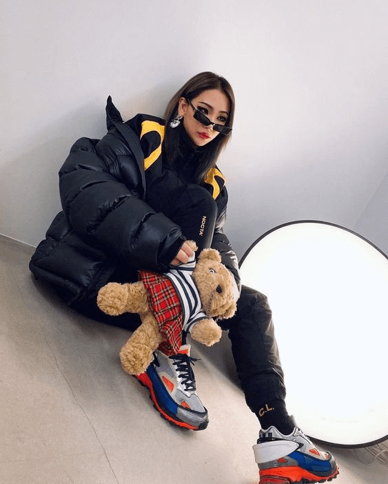 Oversized Black Puffer Jacket with Yellow Accents — Korean Winter Outfits