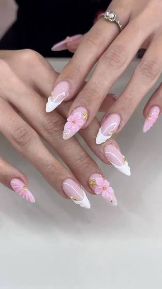 3D Floral French Tips on Stiletto Almonds 3D Floral French Tips on Stiletto Almonds — almond nail inspo
