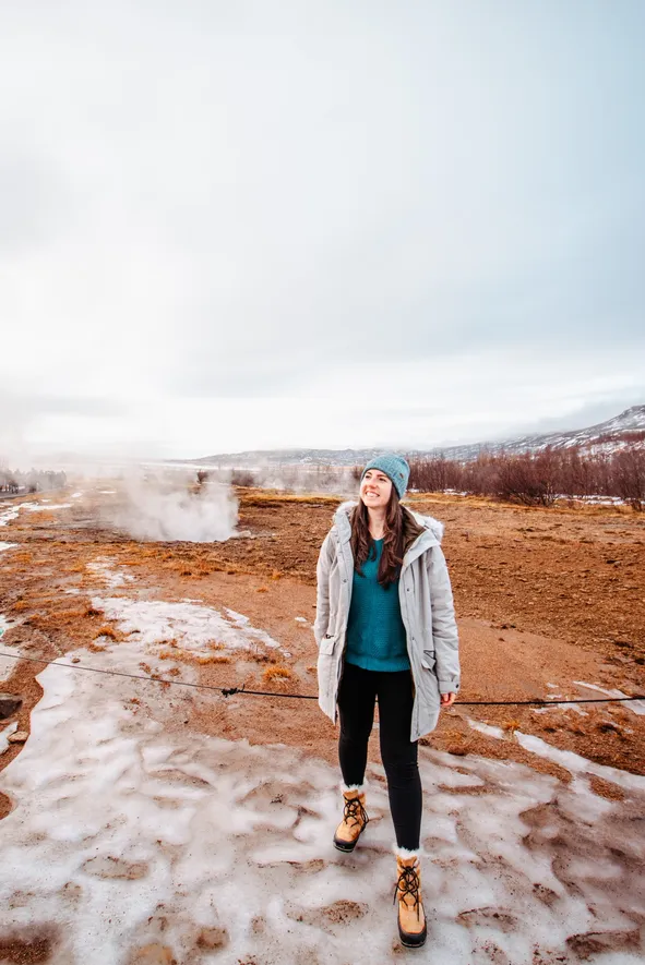 Grey Longline Puffer and Teal Sweater for Geothermal Sightseeing — Iceland Winter Outfits