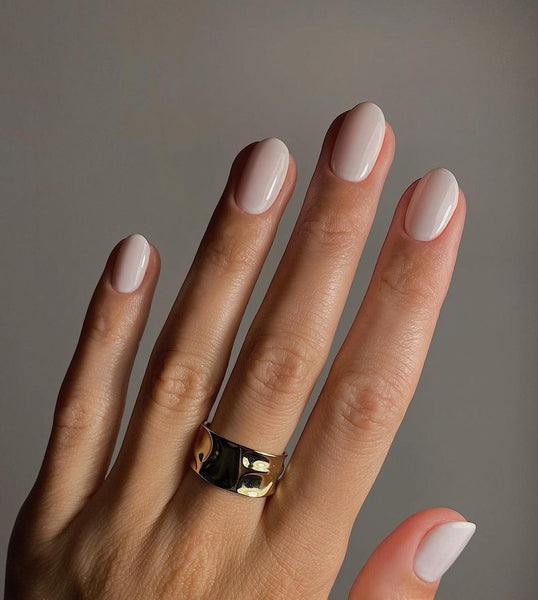 Glossy Nude Beige Medium Oval Nails Glossy Nude Beige Medium Oval Nails — Winter Nail Colors for Pale Skin